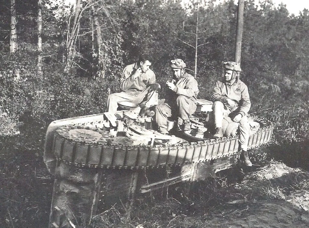 Overturned M3 light tank that overturned after it slid off the muddy roadway. (Robertson Collection)