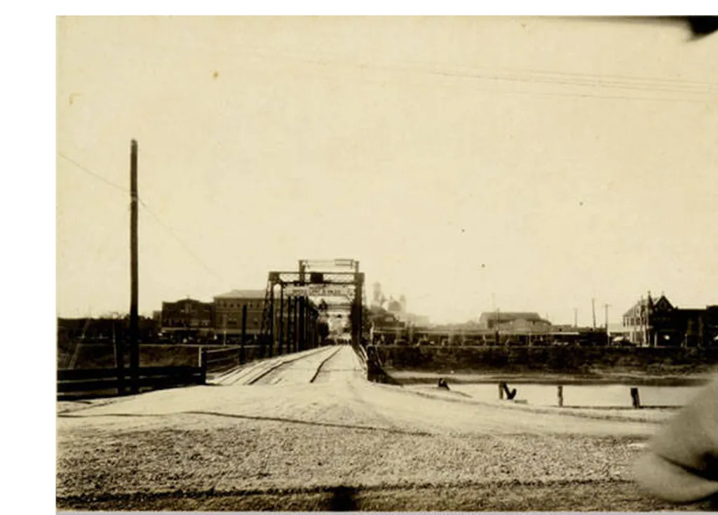 Cane River Bridge. Front Street in background. 