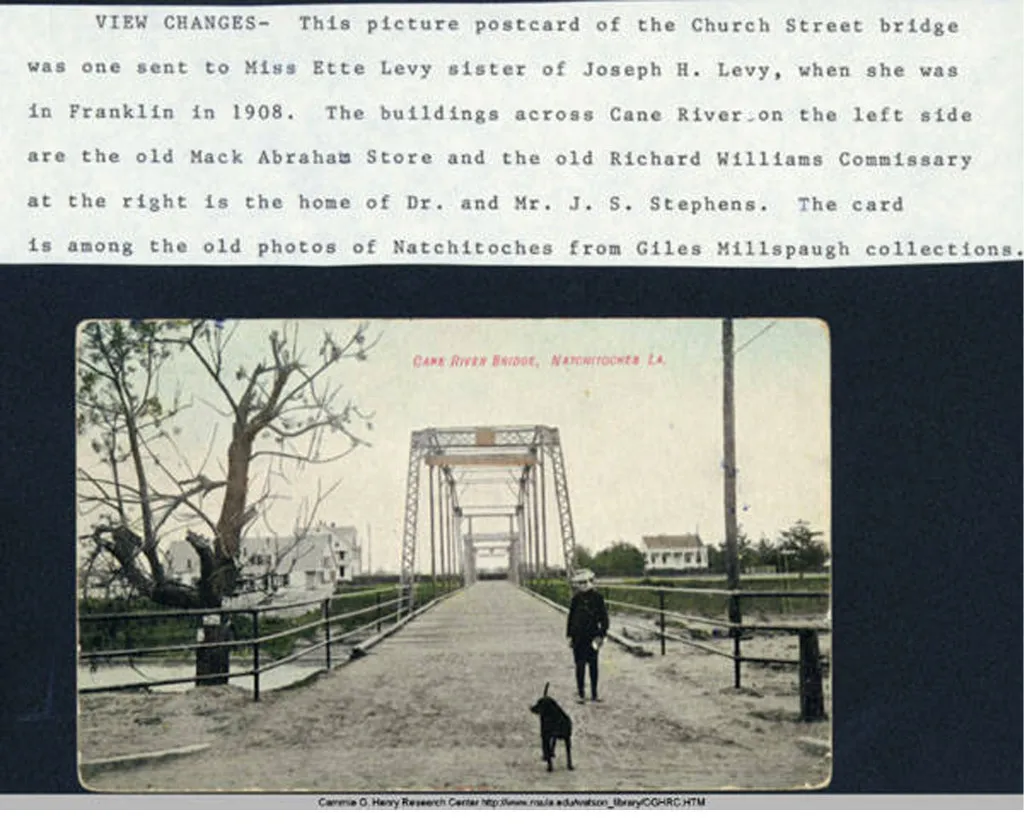 1908- Church Street Bridge (Cane River Bridge), Natchitoches, Louisiana. "VIEW CHANGES- This picture postcard of the Church Street bridge was one sent to Miss Ette Levy sister of Joseph H. Levy, when she was in Franklin in 1908. The buildings across Cane River on the left side are the old Mack Abraham Store and the old Richard Williams Commissary at the right is the home of Dr. and Mr. J.S. Stephens. The card is among the old photos of Natchitoches from Giles Millspaugh collections." 