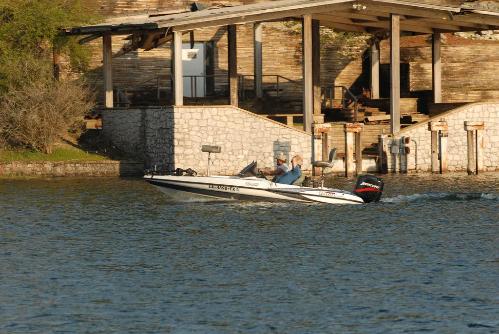 Fishing boat in front of Hodges House in 1990s.