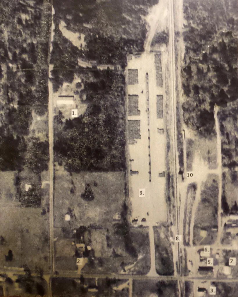 An aerial from 1960s or 70s, some time after Herbert Irwin relocated to Noble, Louisiana. Provided by "Smokey" author Jackie Knott, the photo shows: ; #1 is Smokey&#x27;s building, #2 is the Mayor Knott and family house, #3 the Noble Mercantile.