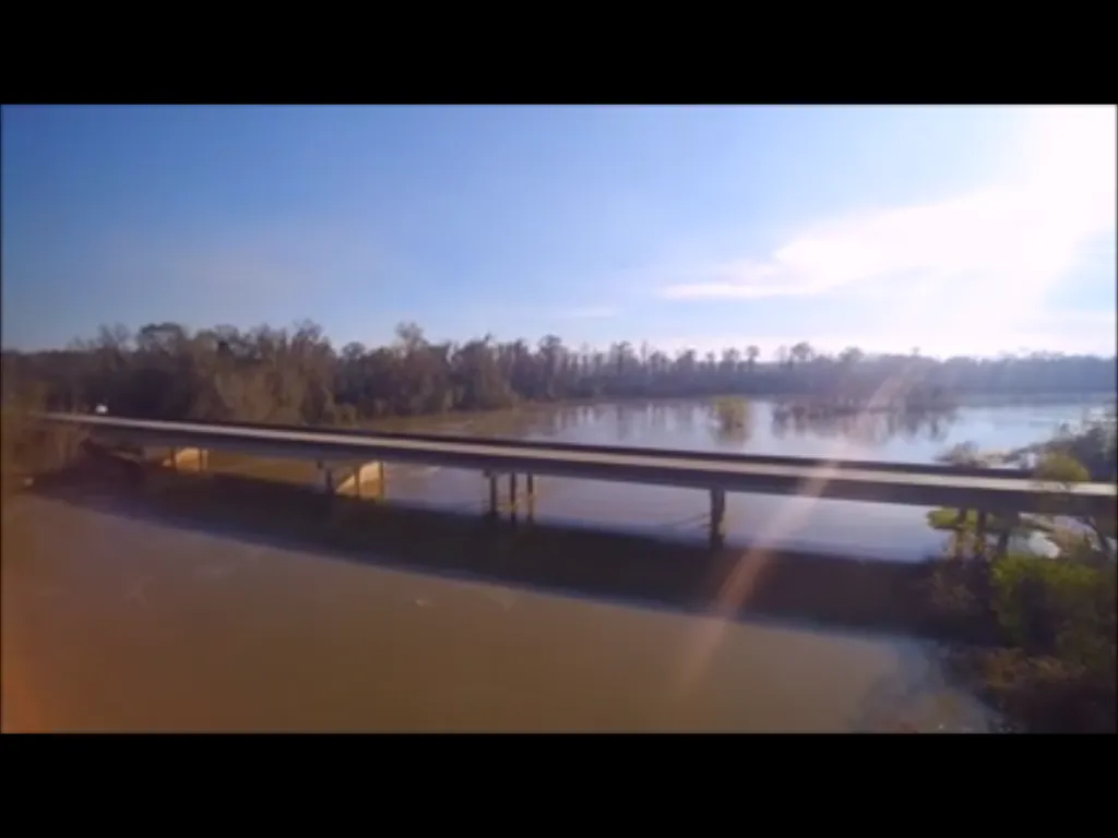 Bridge today, as part of US Hwy. 190 system.  Not sure when the bridge was constructed... Looked a good bit online but did not find a date pinpointed.  Feel free to comment if you know more about this bridge.  NOTE:  We took this photo from the air this past December... The river was at flood stage at this time... So it may appear quite high in these photos because it is quite high.