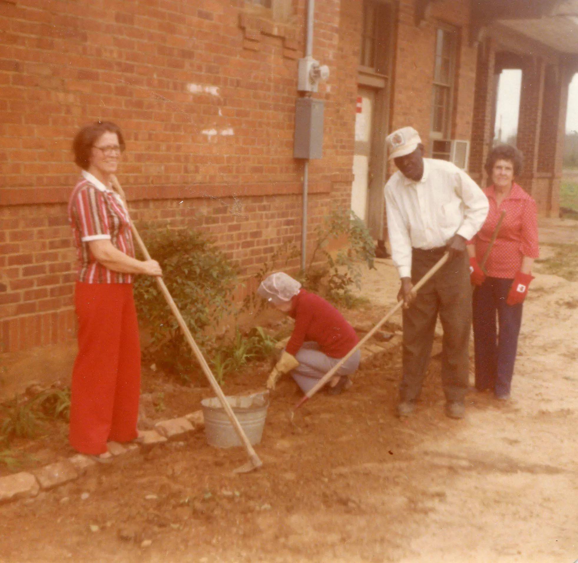Photograph from the Facebook post “Helping hands working at the Depot in Many (I think) many years ago.”