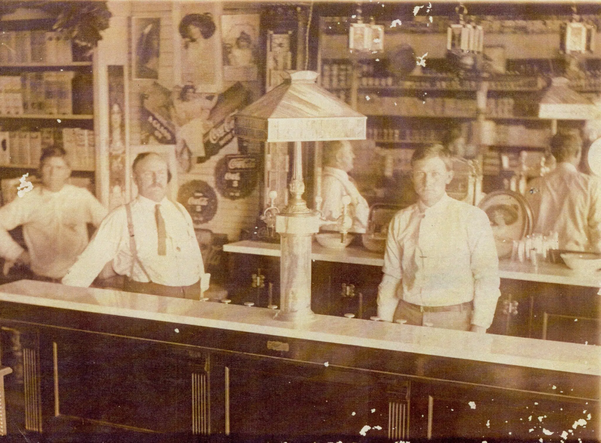 Photograph from the Facebook post “Any details on this photo, of a drug store in Sabine Parish in early 1900s, would be…”