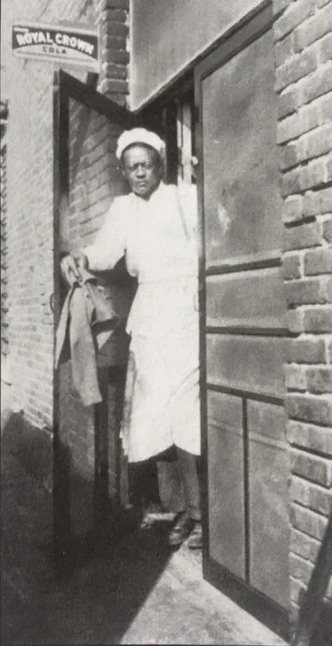 Photograph from the Facebook post “"Sparrow" McClanahan was a popular cool at the American Cafe located in downtown Many.”