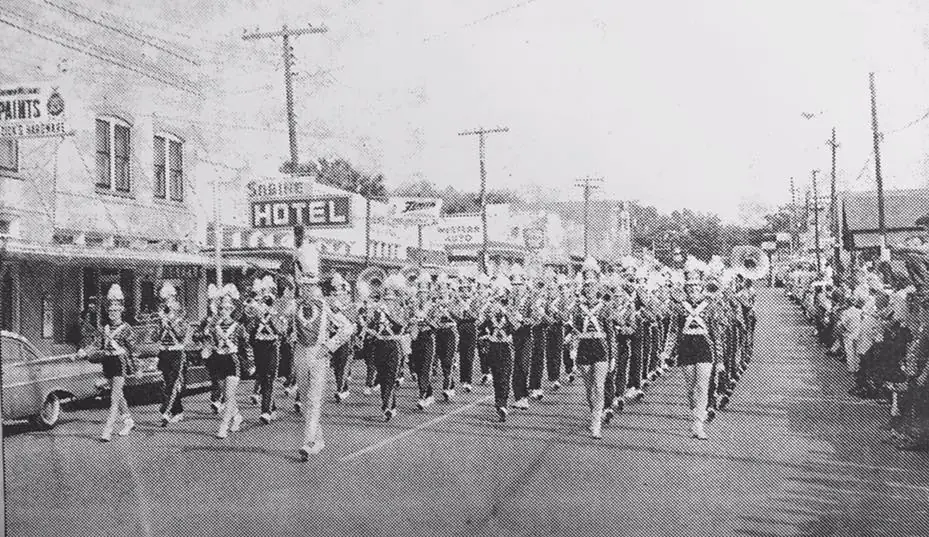 Photograph from the Facebook post “Many High School band in 1963 homecoming parade.”