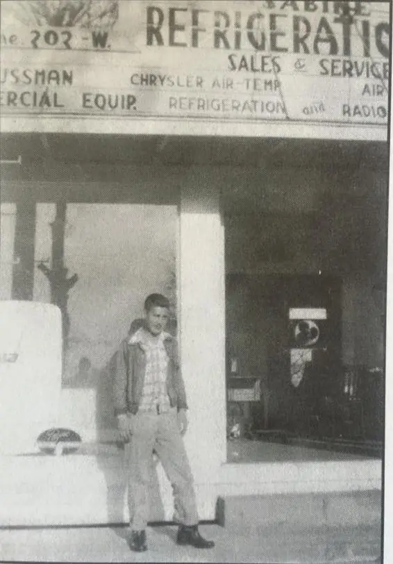 Photograph from the Facebook post “1950, Ray Williams in front of Sabine Refrigeration, which I think was located behind…”