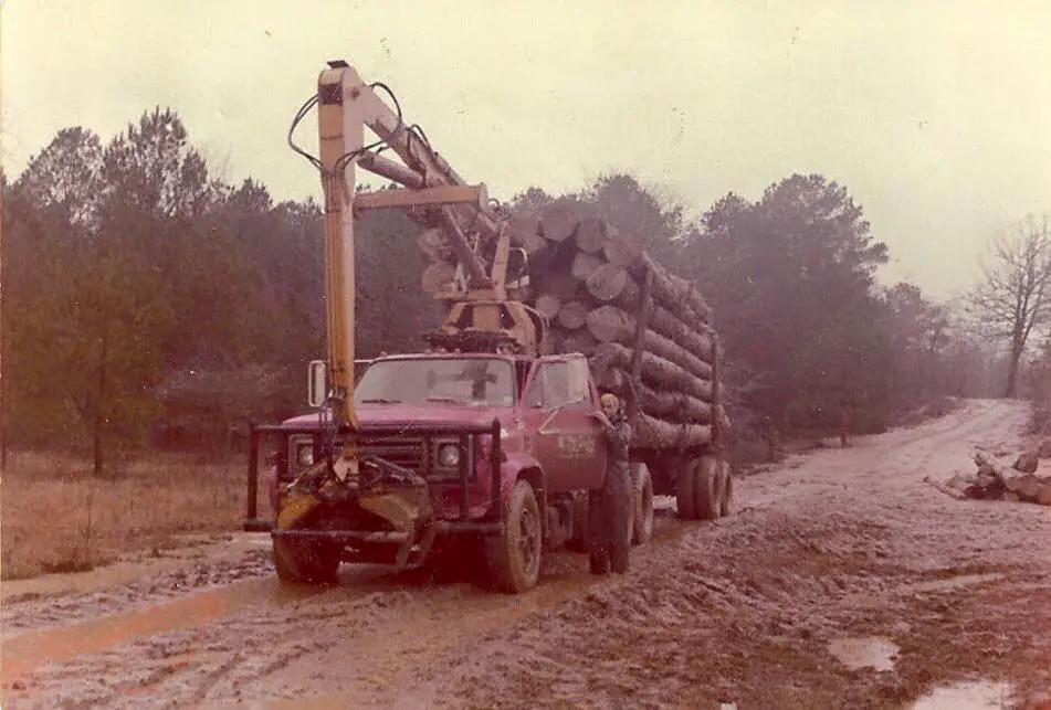 Photograph from the Facebook post “Jerry Slaughter and his "self loading" log truck.”