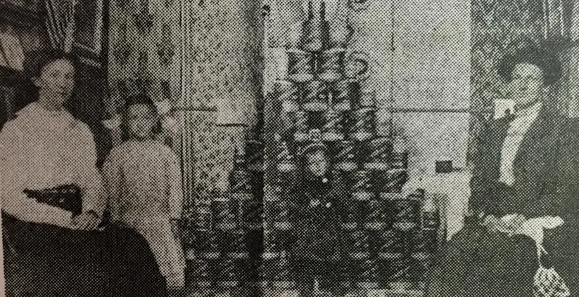 Photograph from the Facebook post “Booth at Sabine Parish Fair in 1914.”