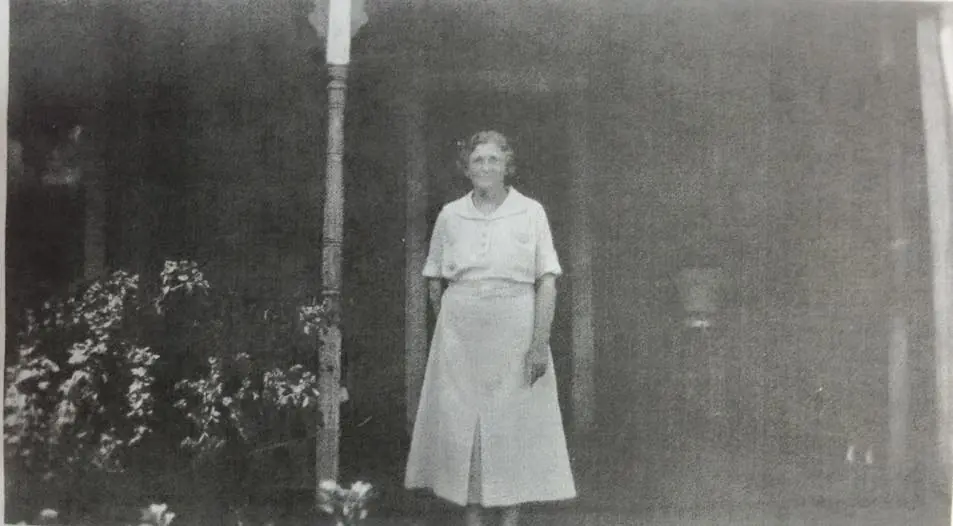 Photograph from the Facebook post “Elizabeth Dillon Peterson on the front porch of her home in the late 1930s.”