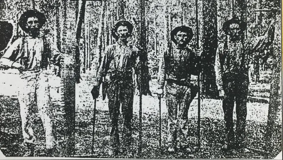 Photograph from the Facebook post “Loggers around 1900.”