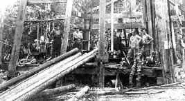 Photograph from the Facebook post “1916, one of the first oil rigs in Sabine County was at Sabinetown (possibly originally…”