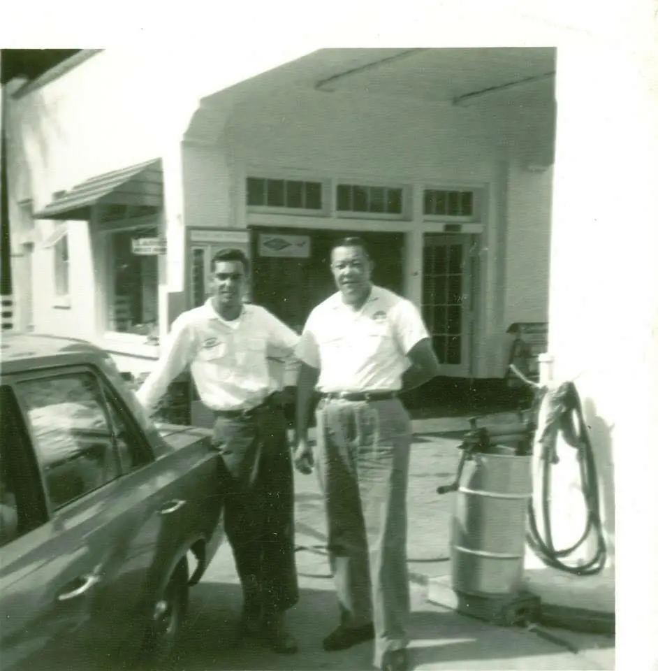Photograph from the Facebook post “Doc Rodrigues and Levi Remedies at service station in Many, 1967.”