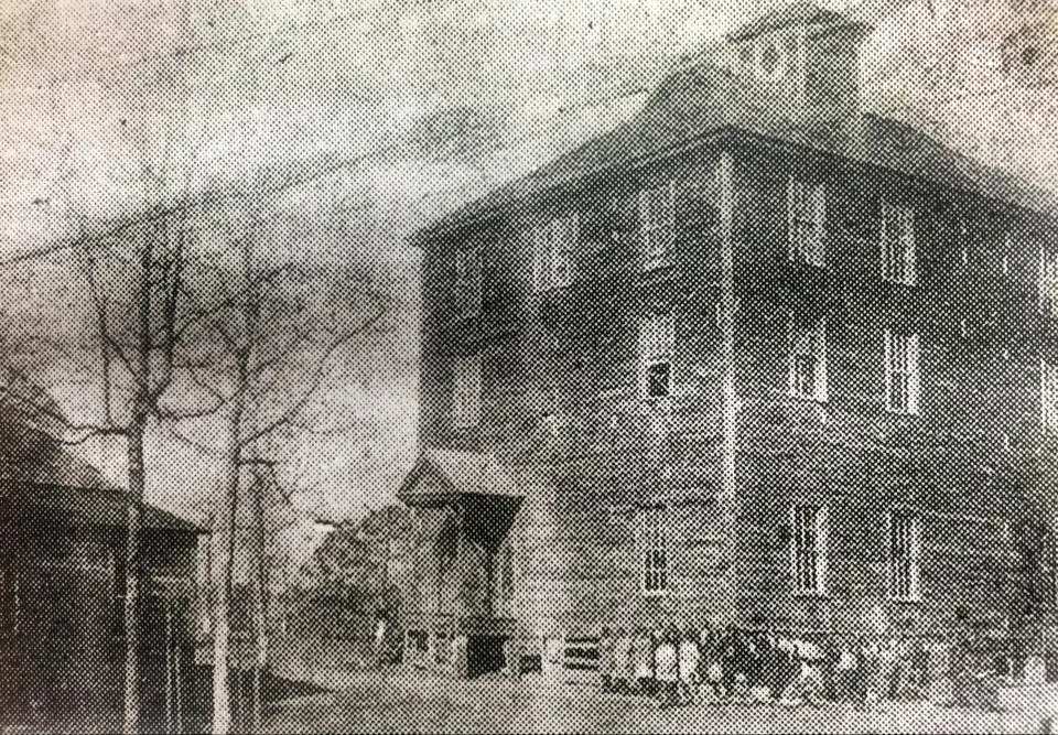 Photograph from the Facebook post “This three story building on Highland Avenue in Many a school...”