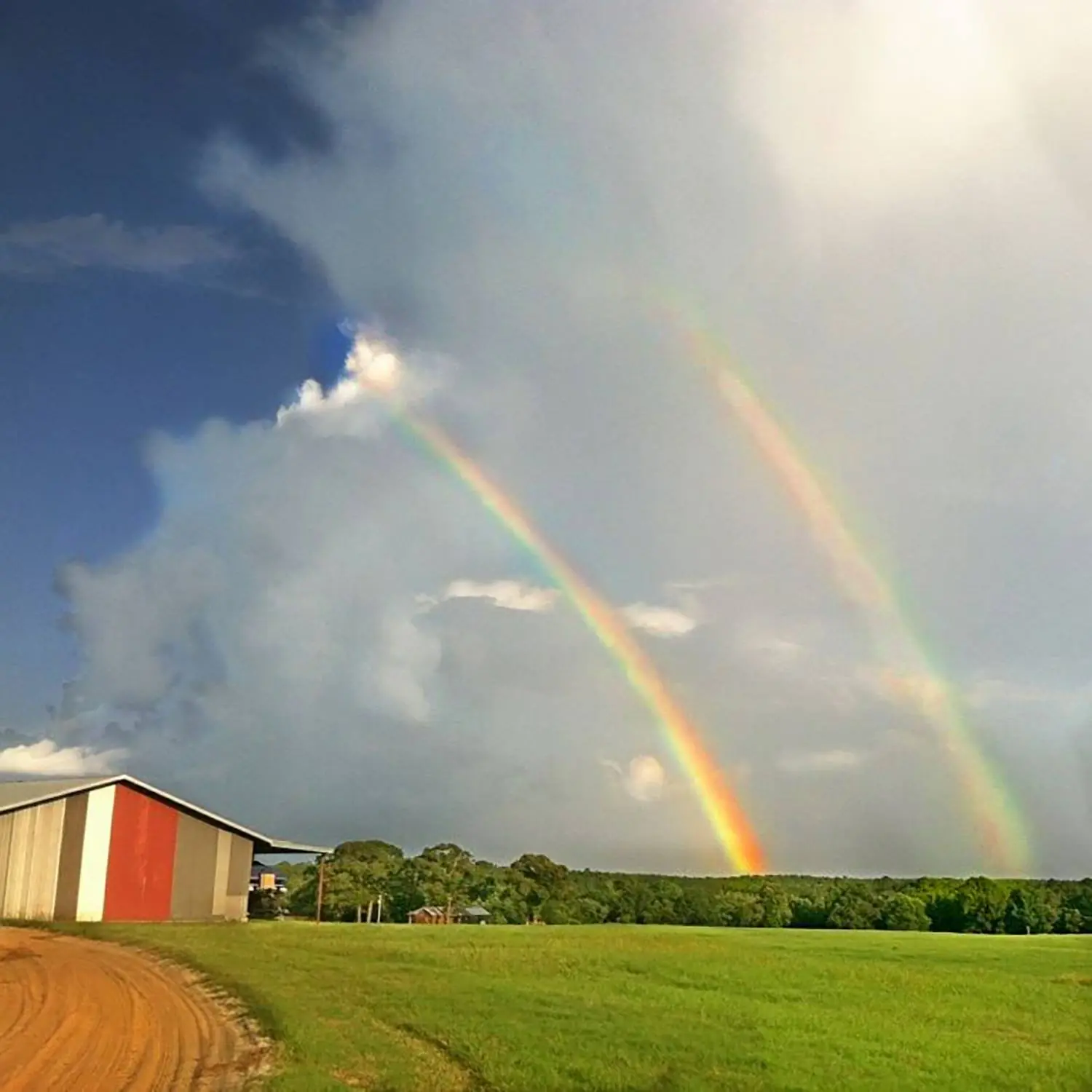 Photograph from the Facebook post “Double rainbow, taken last summer at a farm off Mt.”