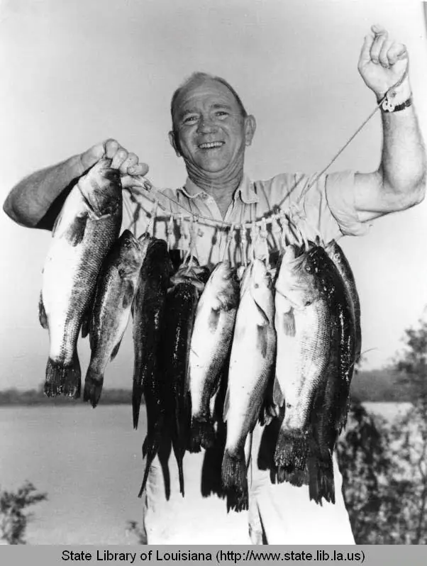 Photograph from the Facebook post “1068, from Louisiana State Library, unidentified man with fish caught out of Toledo Bend”