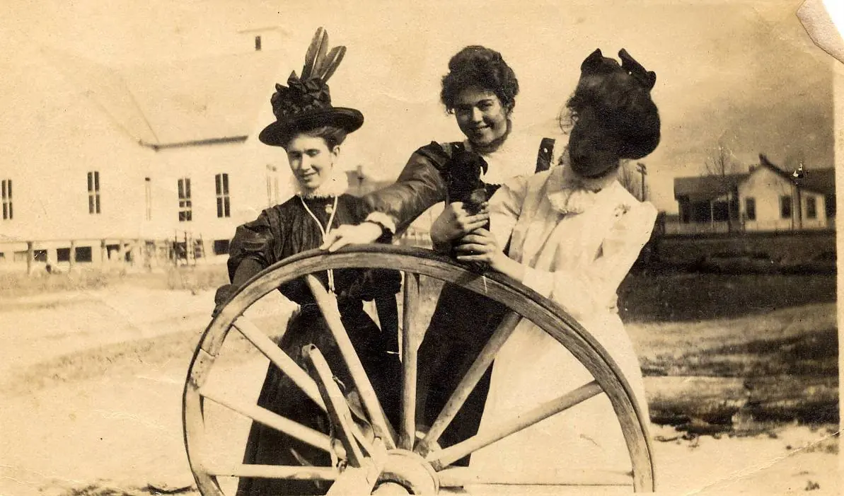 Photograph from the Facebook post “From McNeese State University, this 1910 photo is of three women posing with a small…”