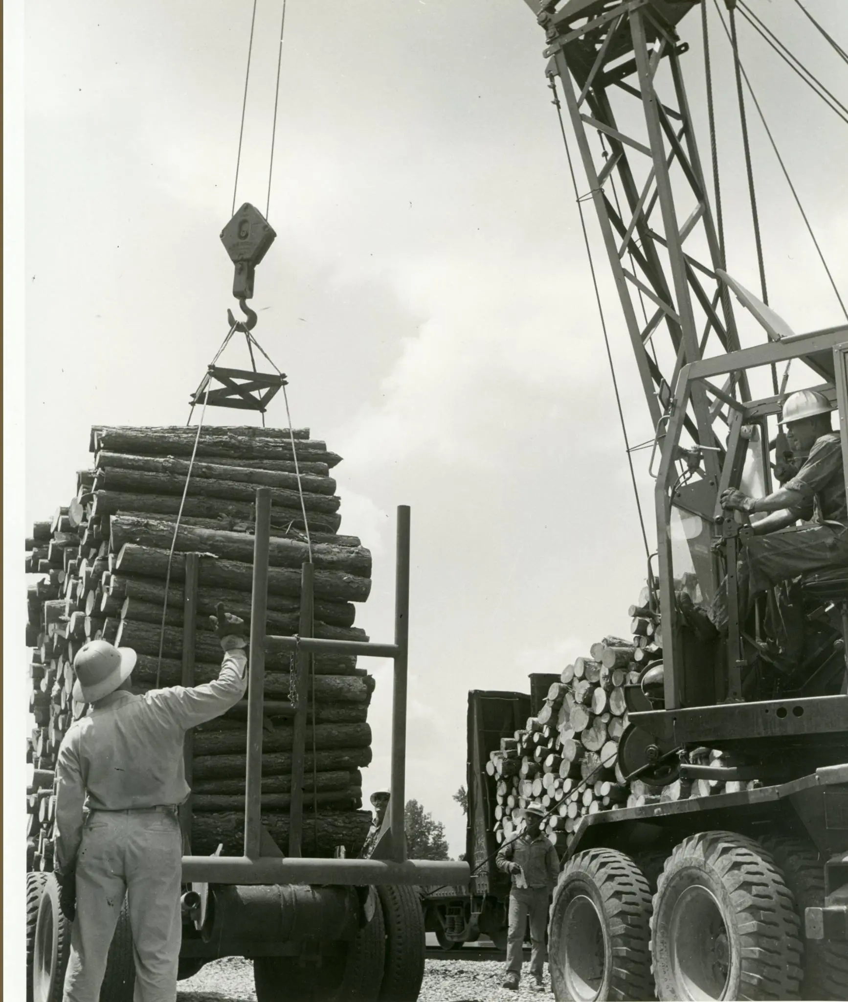 Photograph from the Facebook post “Unloading truck at Noble Wood Yard, Noble, Louisiana (north of Zwolle).”