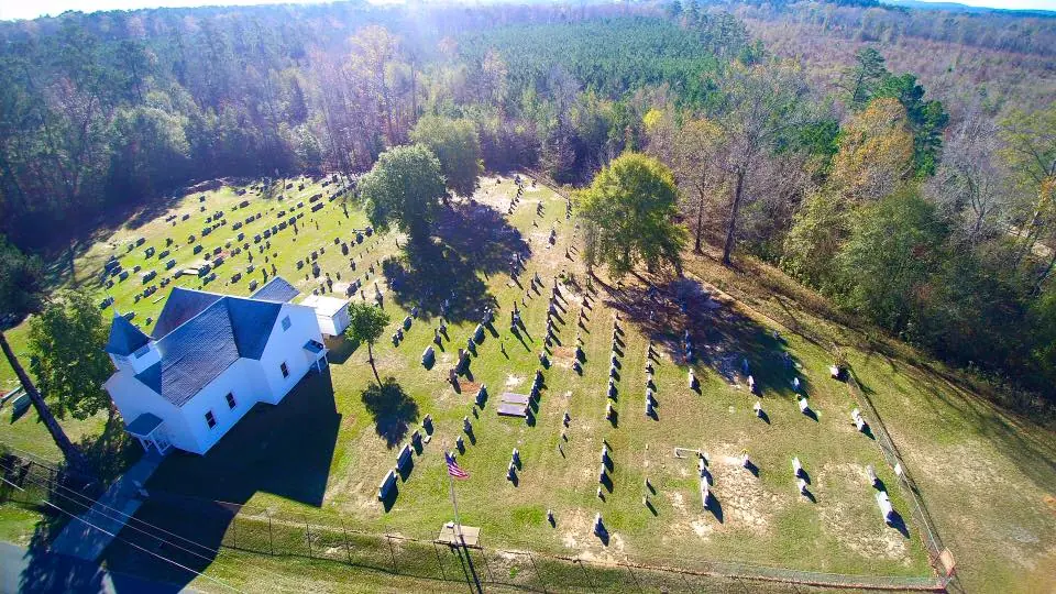 Photograph from the Facebook post “A look from above the historic Holly Grove United Methodist Church and Cemetery in…”