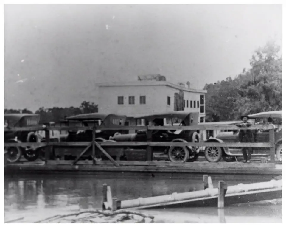 Photograph from the Facebook post “In Orange County, Texas, Photograph of a ferry crossing Sabine River.”