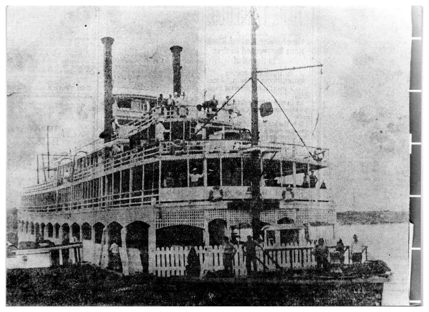 Photograph from the Facebook post “Photograph of the Steamboat Harry Lee - later to be the Showboat - docked across the…”