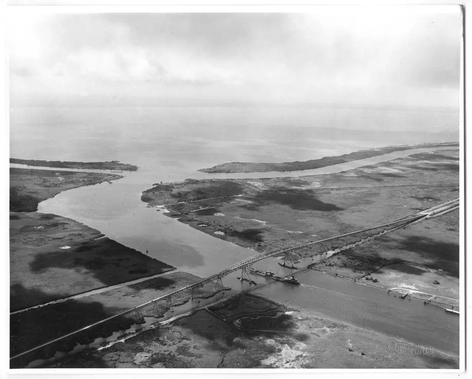 Photograph from the Facebook post “Photograph with aerial view of the Rainbow Bridge spanning the Neches River near Port…”