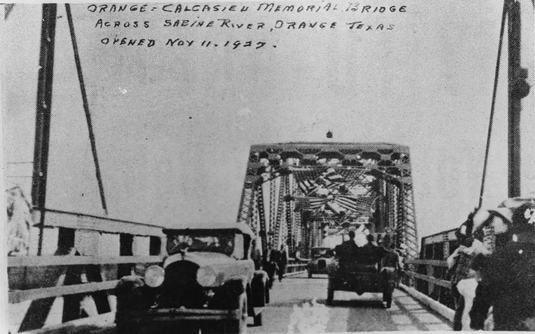 Photograph from the Facebook post “Photograph of automobiles traveling on the Orange - Calcasieu Memorial Bridge across the…”