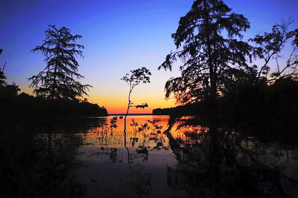 Photograph from the Facebook post “Sun sets on a cove on Toledo Bend Lake, near Cypress Bend Resort on the Louisiana side”