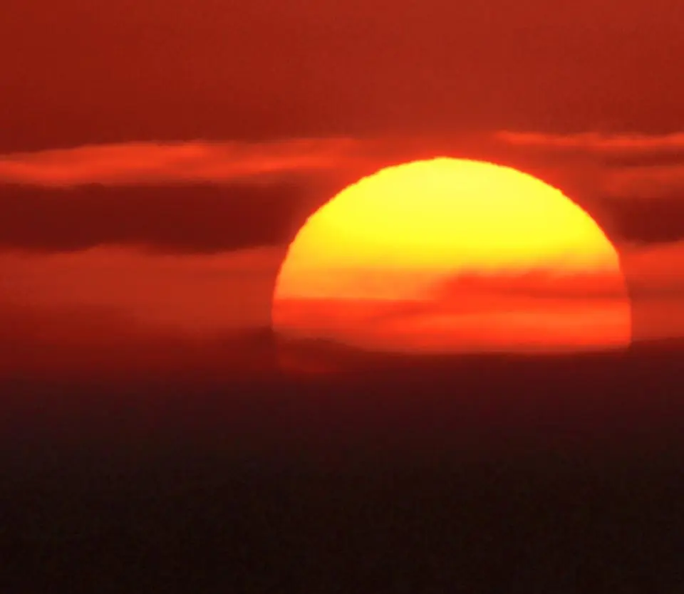 Photograph from the Facebook post “Sun set over the Louisiana / Texas border.”
