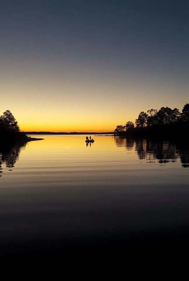 Photograph from the Facebook post “Shared by Jayme Arnold, this photo was taken in October of her husband and son fishing…”