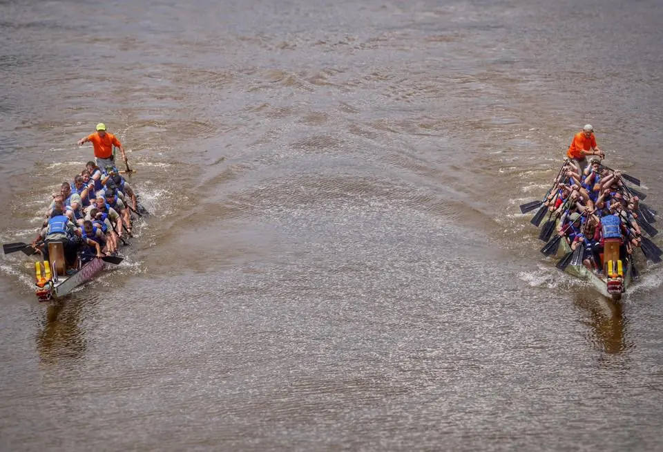 Photograph from the Facebook post “"Photo Finish" First and second placers in the Dragon Boat races in Natchitoches,…”