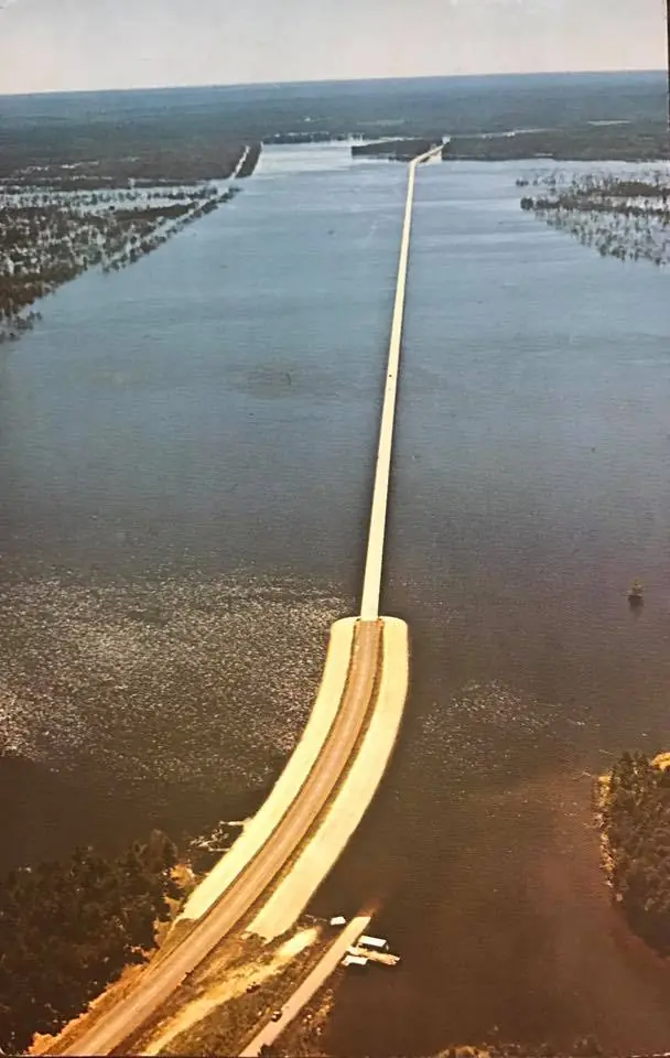 Photograph from the Facebook post “Postcard I came across, Pendleton Bridge over Toledo Bend Lake from Louisiana looking…”