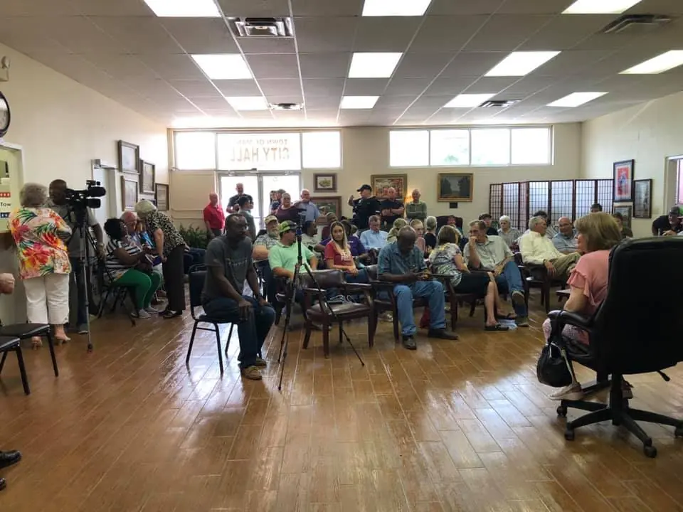 Photograph from the Facebook post “Almost standing room only at Town of Many meeting.”
