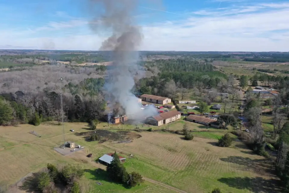 Photograph from the Facebook post “A section of Apollo Apts on the Middle Creek Road in Many are ablaze.”