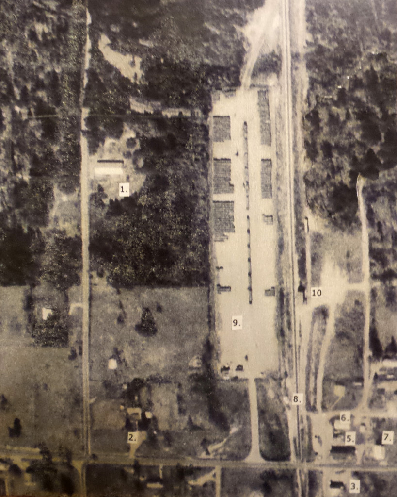 An aerial from 1960s or 70s, some time after Herbert Irwin relocated to Noble, Louisiana. Provided by "Smokey" author Jackie Knott, the photo shows: ; #1 is Smokey's building, #2 is the Mayor Knott and family house, #3 the Noble Mercantile.