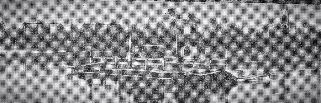 1931. On the Sabine River between Merryville, Louisiana and Bon Weir, Texas. From The Beaumont Enterprise, "The old hand-powered ferry which took its departure with the erection of the bridge. This is one of the old and historical crossings of the Sabine river."