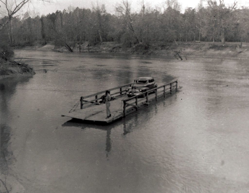 From the photo collection of D. T. Kent, this was taken near Kirbyville, Texas (Jasper County).  I believe it is on the Neches River, however, not the Sabine, though I do not k know for sure.  A reader had suggested it was Sheffield Ferry.  Kent's collection does contain some photos on or around the Sabine.  
